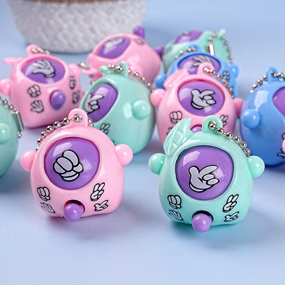 Alien rock-paper-scissors egg keychain