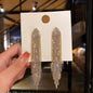 European and American popular diamond-encrusted metal long tassel earrings for women, high-end earrings with niche temperament