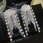 European and American popular diamond-encrusted metal long tassel earrings for women, high-end earrings with niche temperament