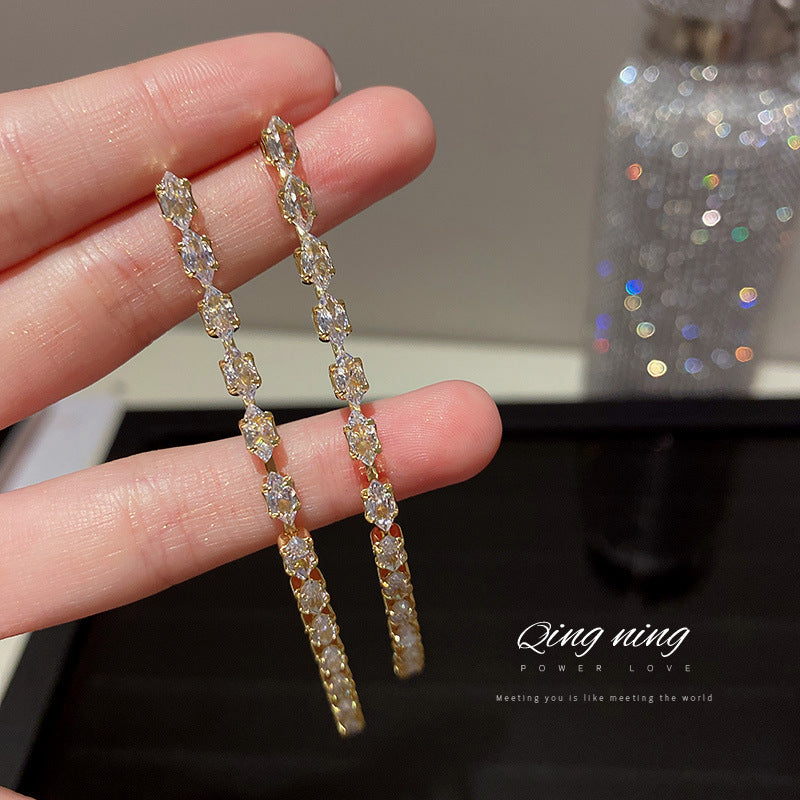 European and American popular diamond-encrusted metal long tassel earrings for women, high-end earrings with niche temperament