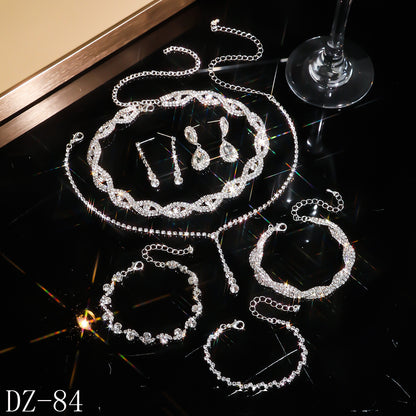 Braided bracelet and rhinestone ring set of four