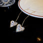 European and American popular diamond-encrusted metal long tassel earrings for women, high-end earrings with niche temperament